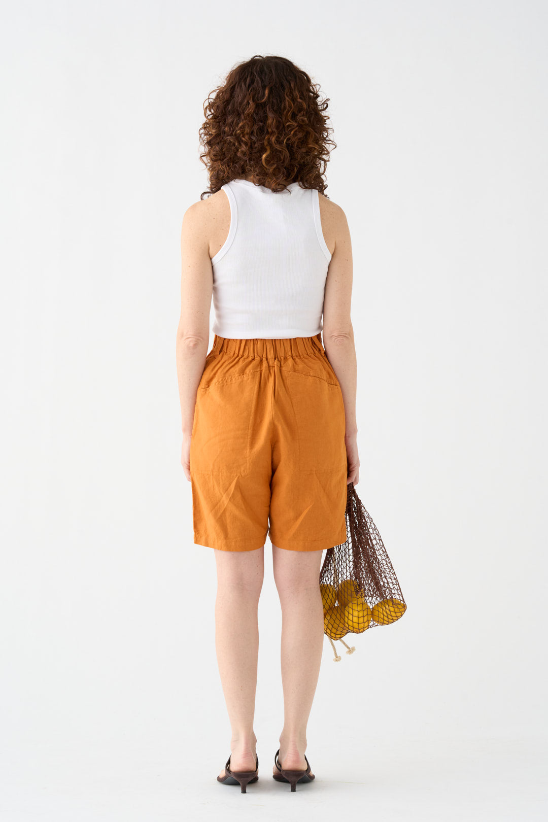 Wide orange Bermuda shorts