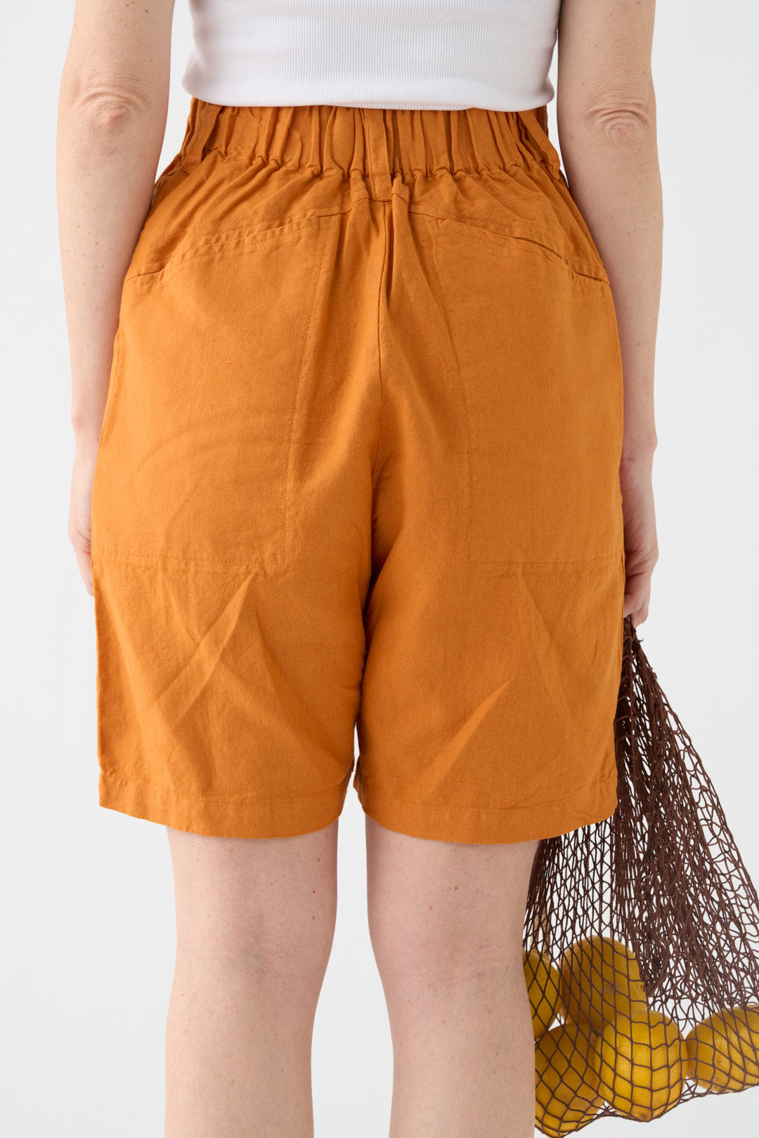 Wide orange Bermuda shorts