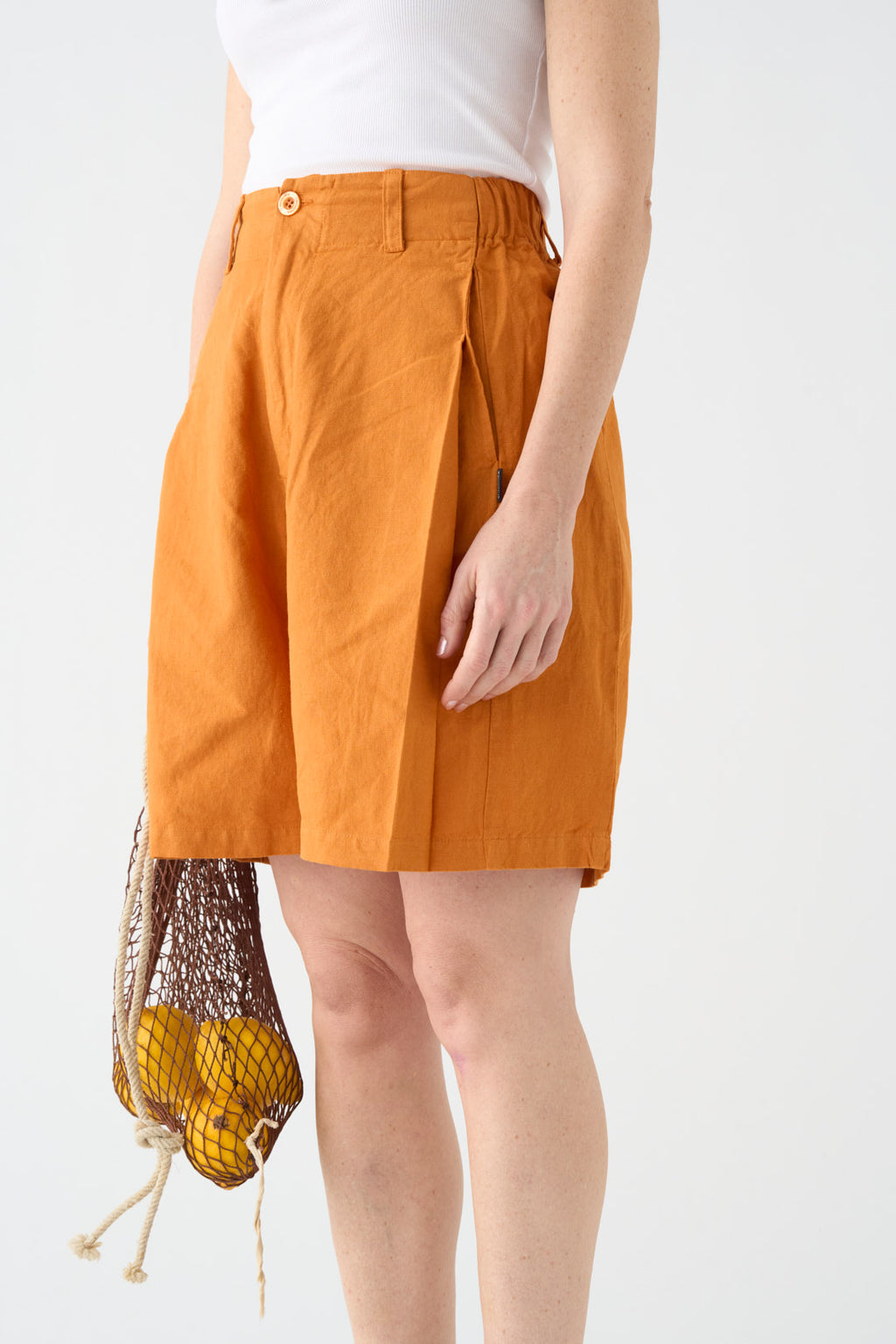 Wide orange Bermuda shorts